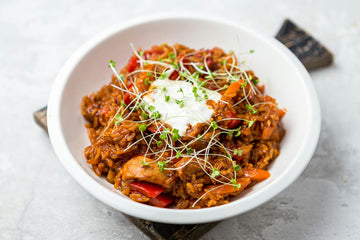 Divide the **rice dish** between plates and serve with **sour cream**.

Enjoy!
