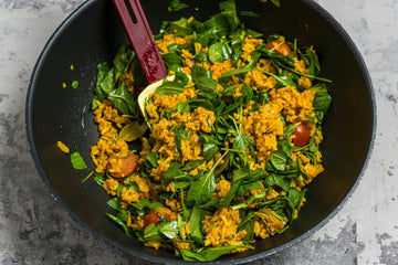 Stir in the **rice, spinach, green beans** and **cherry tomatoes**. Heat over medium heat until the **spinach **starts to wilt.
