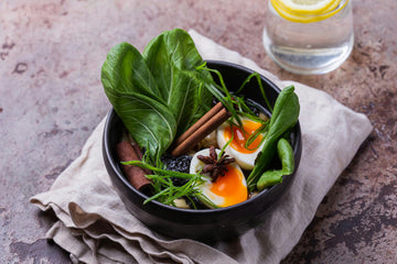 When serving, cut the pre-boiled egg in half and add to the soup.

Enjoy.
