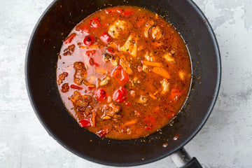 Add **dried oregano, cumin** and **chili flakes** (spicy!). When the **rice **is ready and the water has been absorbed, check the seasoning and add **salt **and **pepper **if necessary.
